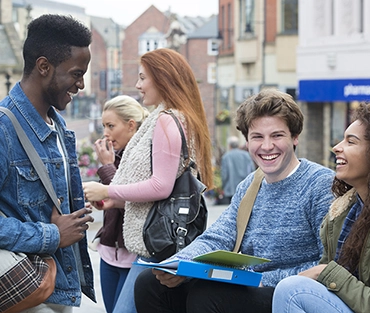 Students socialising in town centre